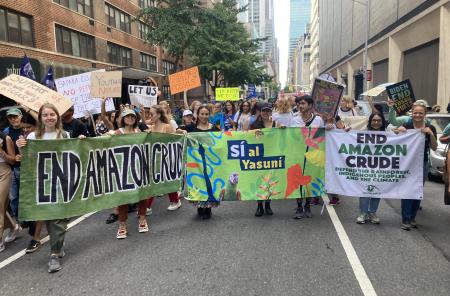 image protesters against amazon crude
