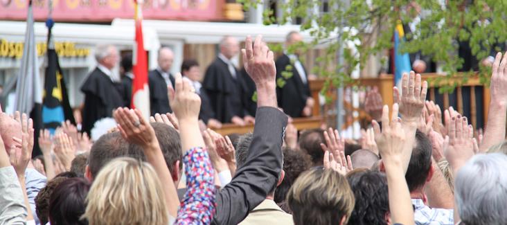 Swiss people vote. Photo: hdzimmermann, flickr