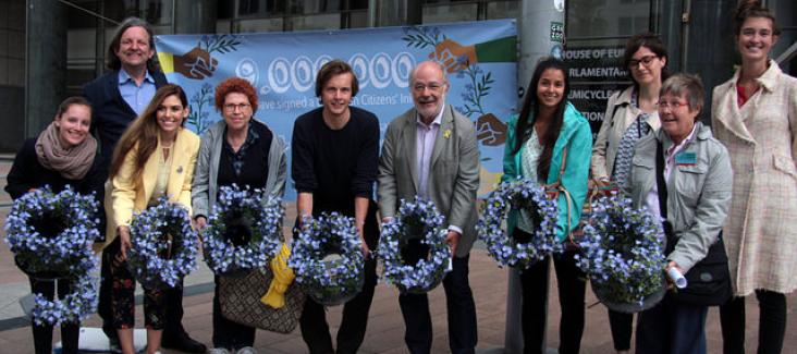 Activists handed out forget-me-not flowers to Members of the European Parliament to remind them of their duty towards the 9 million citizens who have signed a European Citizens' Initiative - MEP Josep-Maria Terricabras (Spain - Greens/EFA) stopped by to r